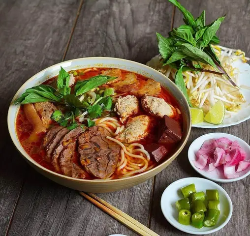 Top Đặc Sản Huế Tại Đà Nẵng: Gợi Ý Mua Quà (hàng Khô) & Quán Ăn Ngon Chuẩn Vị 2025 Top Đặc Sản Huế Tại Đà Nẵng: Gợi Ý Mua Quà (hàng Khô) & Quán Ăn Ngon Chuẩn Vị 2025