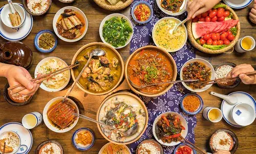 Tổng Hợp Đặc Sản Trương Gia Giới 2027: Top Món Ăn Bắt Buộc Thử, Quà Mang Về & Quán Ăn Địa Phương Yêu Thích